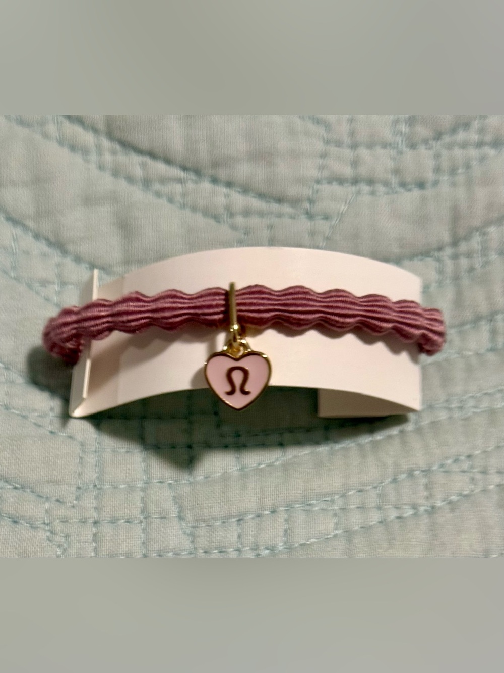 lululemon, NWT, elastic hair tie or bracelet features Heart Charm lululemon logo - Picture 1 of 5